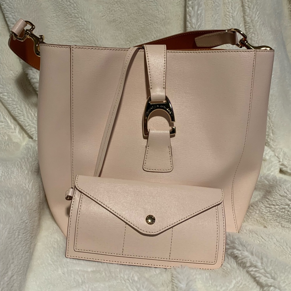 Dooney & Bourke Saffiano Leather Shoulder Bag with wristlet. Never been used.